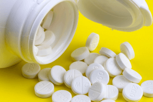 pills spilling out of bottle