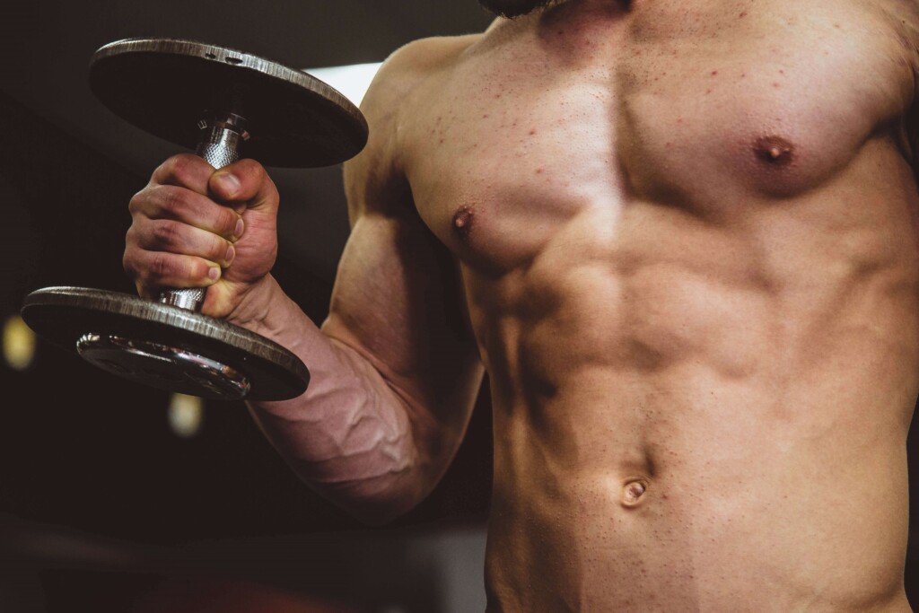 man holding a dumbbell